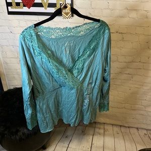 Turquoise blue blouse by Old Navy size 1X sorry about the wrinkles.  NWOT
